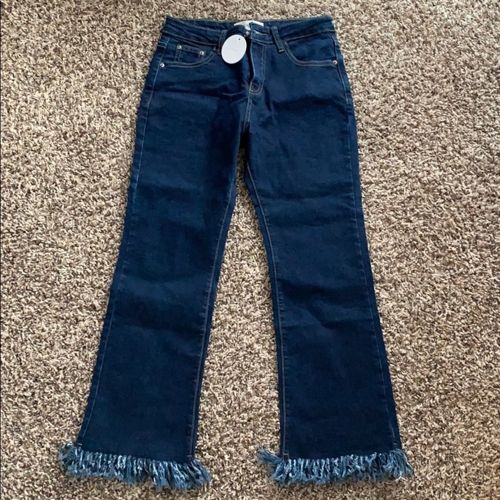 NWT jeans with fringe bottom